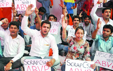 ABVP students shout slogans during a demonstration against the Civil Services Aptitude Test at Jantar Mantar in New Delhi on Sunday.