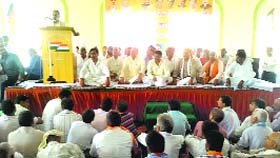 Union Minister Krishan Pal Singh Gurjar addresses a workers meeting at Kosli in Rewari on Sunday