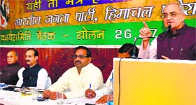 BJP national vice-president and state in charge Balbir Punj addresses party leaders on the concluding day of the three-day state executive meeting in Solan on Sunday