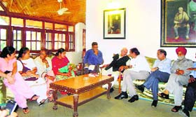 Brij Behari Butail, Speaker of the HP Assembly, addresses state government officers and municipal councillors at Palampur on Thursday