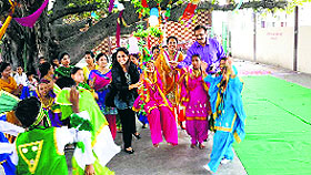 Children enjoy during the Teej celebrations in Ludhiana. 