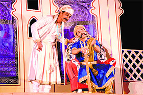 Artistes enact a scene from the play, "Bhamashah", at Guru Nanak Dev Bhawan, in Ludhiana on Sunday.