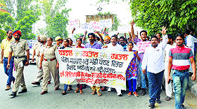 Members of the Valmiki Sewa Sangh hold a protest rally in favour of the fisheries students.