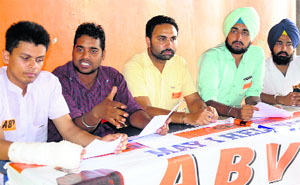 ABVP leaders address a press conference at the Student Centre of Panjab University, Chandigarh, on Monday.