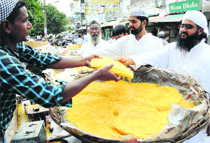 Residents purchase sevaiyan on the eve of Eid-ul-Fitr at Sector 45, Chandigarh, on Monday.