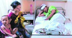 Soijamuan Phiamphu along with his wife and children at  a Gurgaon hospital on Monday. a Tribune photo