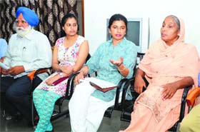 Members of the charitable trust during a meeting at Circuit House in Ludhiana