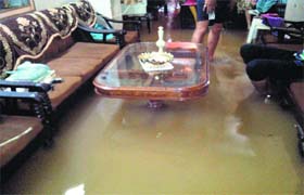 Rainwater enters a house in Ludhiana