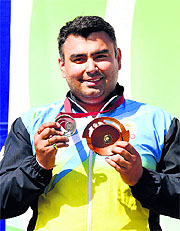 Gagan Narang celebrates after winning the silver medal in the mens 50m Rifle Prone final event.
