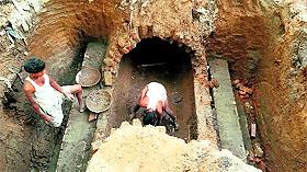 Repair work being carried out in a stormwater pipeline at Phase XI, Mohali.