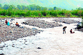 Youths taking bath in the Kaushalaya Dam waters is a common sight.