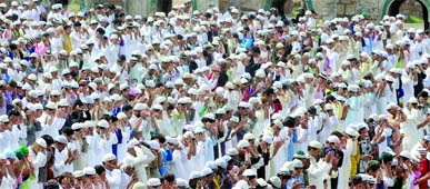 Muslim devotees offer prayers on the occasion of Eid al-Fitr at the Feroz Shah Kotla mosque in New Delhi on Tuesday.