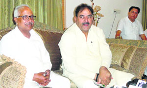Ellenabad MLA Abhay Chautala (right) talks to the media in Sirsa on Monday.