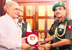 Lt Gen Philip Campose (right), GOC-in-C Western Command,  with Chief Minister  Bhupinder Singh Hooda in Chandigarh on Tuesday.