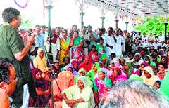 Industries Minister Mukesh Agnihotri addresses a gathering near the newly constructed rain shelter at Bathu panchayat in Una on Tuesday. Photo: Rajesh Sharma