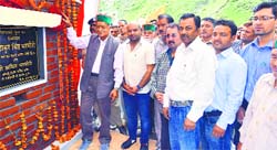 Forest Minister TS Bharmouri lays the foundation stone of the Palani bridge in Bharmour subdivision of Chamba district on Tuesday. photo: Balkrishan Prashar