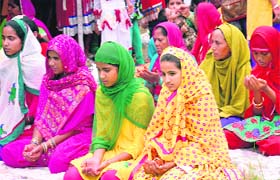 Pious moments: Women offer prayers on the occasion of Eid-ul-Fitr at a mosque in Jalandhar on Tuesday