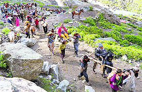 Pilgrims pass through Chandanwadi on their way to the Amarnath cave.