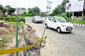 The broken iron grill at Panama Chowk in Jammu can cause an accident. 