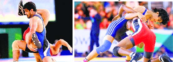 Sushil Kumar beats Qamar Abbas of Pakistan in the 74kg gold medal bout. (right) Vinesh Phogat wrestles with Rosemary Nweke of Nigeria in the 48kg quarterfinal bout. The Haryana girl went on to win the gold medal.  Reuters 