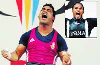 Vikas Thakur, the Himachal lad, is ecstatic after winning a silver medal in the 85kg weightlifting event. (inset) Sivalingam