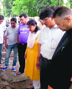 Mussoorie MLA Ganesh Joshi (extreme right) along with officials of the district administration inspects a water-logged road in Dehradun on Tuesday.
