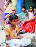 Daughter of the deceased and other relatives mourn at Janta Nagar in Bathinda on Wednesday. Tribune photo: Pawan sharma