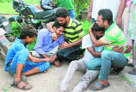 Youths who had a narrow escape mourn their friends' death along with relatives