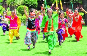 Students in a jubilant mood during the Teej celebrations at Aanchal International School, Sector 41, Chandigarh, on Wednesday