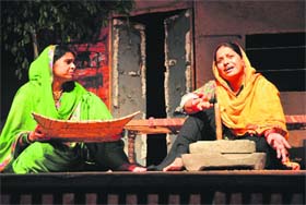 All for love: Artistes enact a scene from Balwant Gargi’s first play, “Loha Kut”, during the Third TFT Summer Theatre Festival at the Punjab Kala Bhawan, Sector 16, Chandigarh, on Wednesday