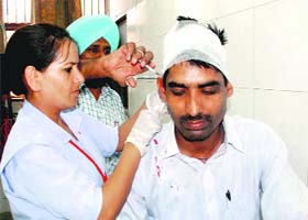 The police reportedly took over 10 persons in custody and started investigation. Injured Sunder Singh being treated at the Civil Hospital in Dera Bassi