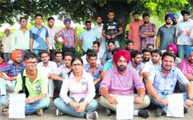 NSUI supporters protest in front of the Vice-Chancellor’s office at Punjab University on Wednesday