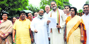 Haryana BJP leaders display the memorandum, which they submitted to the Governor in Chandigarh on Wednesday.