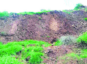 The landslide that hit Nayangal village near Kotla forcing families to shift to safe places in Nurpur village.