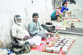 Quacks sell medicines on a footpath in Jammu