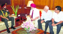 General Bikram Singh with members of the Indian Ex-Servicemen Movement in New Delhi on Wednesday. Tribune photo