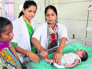 The abandoned baby girl being examined at the Civil Hospital in Bathinda on Thursday. 