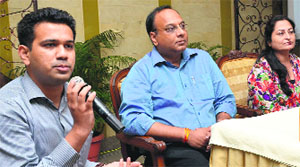 Officials from Dabur India and Prayas Juvenile Aid Centre Society during a press conference in Chandigarh on Thursday
