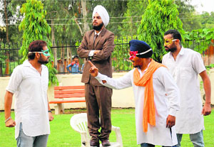 Artistes stage a nukkad natak, “Azaad”, on the Martyrdom Day of Shaheed Udham Singh at PEC Society, Sector 49, Chandigarh, on Friday.