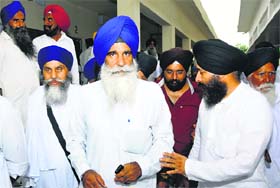 HSGMC president Jagdish Jhinda and other members come out after the first executive committee meeting at Neem Sahib Gurdwara in Kaithal on Thursday