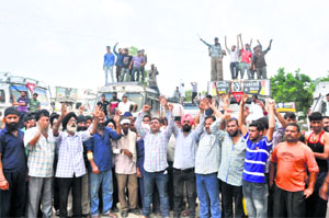 Protesting oil tanker drivers and cleaners seek compensation for two drivers injured in the Kangan assault, in Jammu on Thursday.