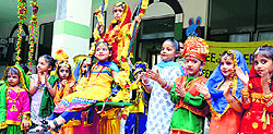 Students of Green Land Senior Secondary School take part in the Teej celebrations in Ludhiana on Thursday