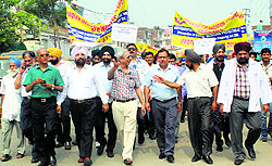 Members of the IMA hold a protest in Ludhiana on Thursday