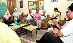 Prof KBS Sodhi with his forum of English writers during a meeting recently