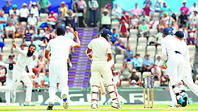 Moeen Ali (left) celebrates the wicket of Pankaj Singh to win the third Test at the Rose Bowl cricket ground in Southampton on Thursday