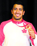 Arjun Gill, who wrestles for Canada beat Indias Satywart Kadian in the final of the 97kg freestyle class on Wednesday