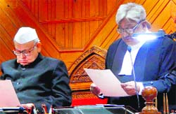 Uttarakhand Governor Aziz Qureshi administers oath to Justice KM Joseph as the ninth Chief Justice of the Nainital High Court in Nainital on Thursday. A Tribune photograph