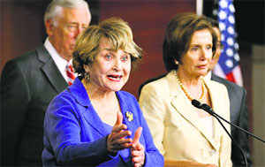 House Rules Committee ranking member Rep. Louise Slaughter talks to reporters after the House voted 225-201 to authorise a lawsuit against the US President on Wednesday.