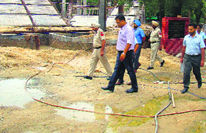 Dr Basant Garg inspects the construction site of the boys hostel and the students centre at Giani Zail Singh PTU Campus in Bathinda on Friday.