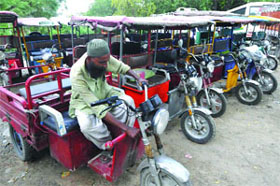 Some of the e-rickshaws have been impounded by the traffic police after the High Court ban, at Minto Road in New Delhi on Friday.